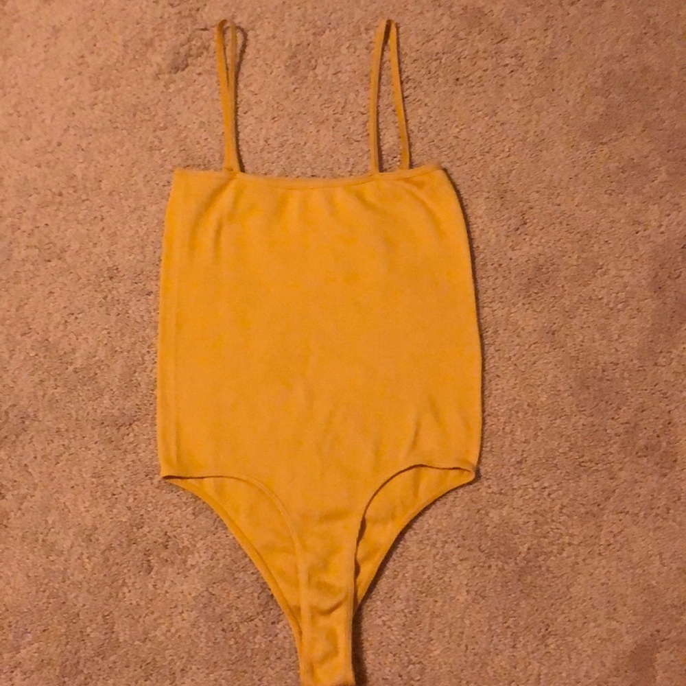 mustard colored body suit from pacsun!!!